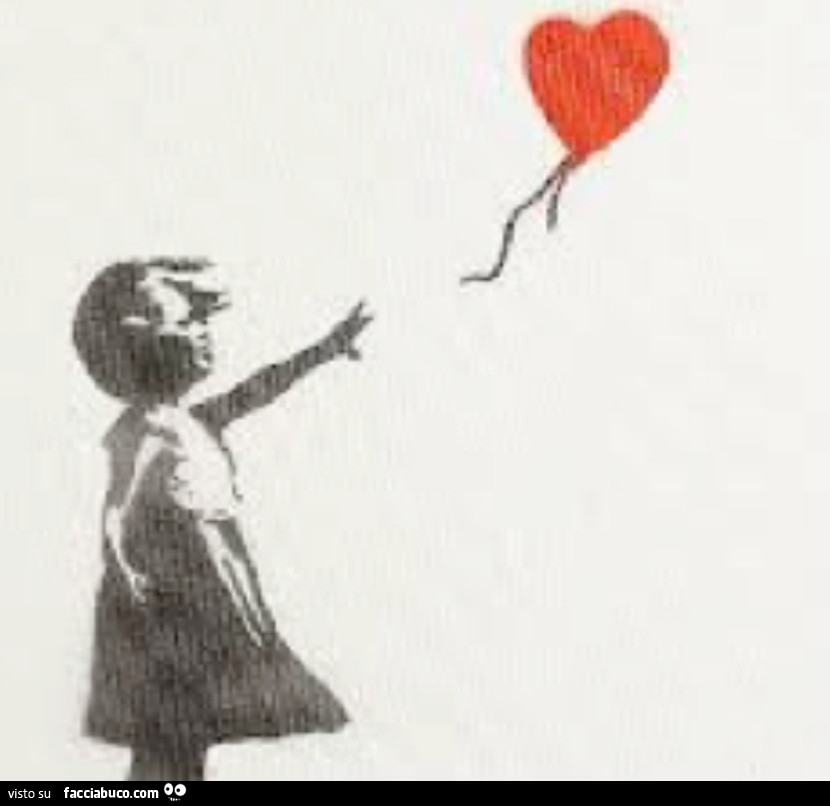 Bimba con palloncino a cuore