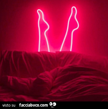 Neon a forma di gambe